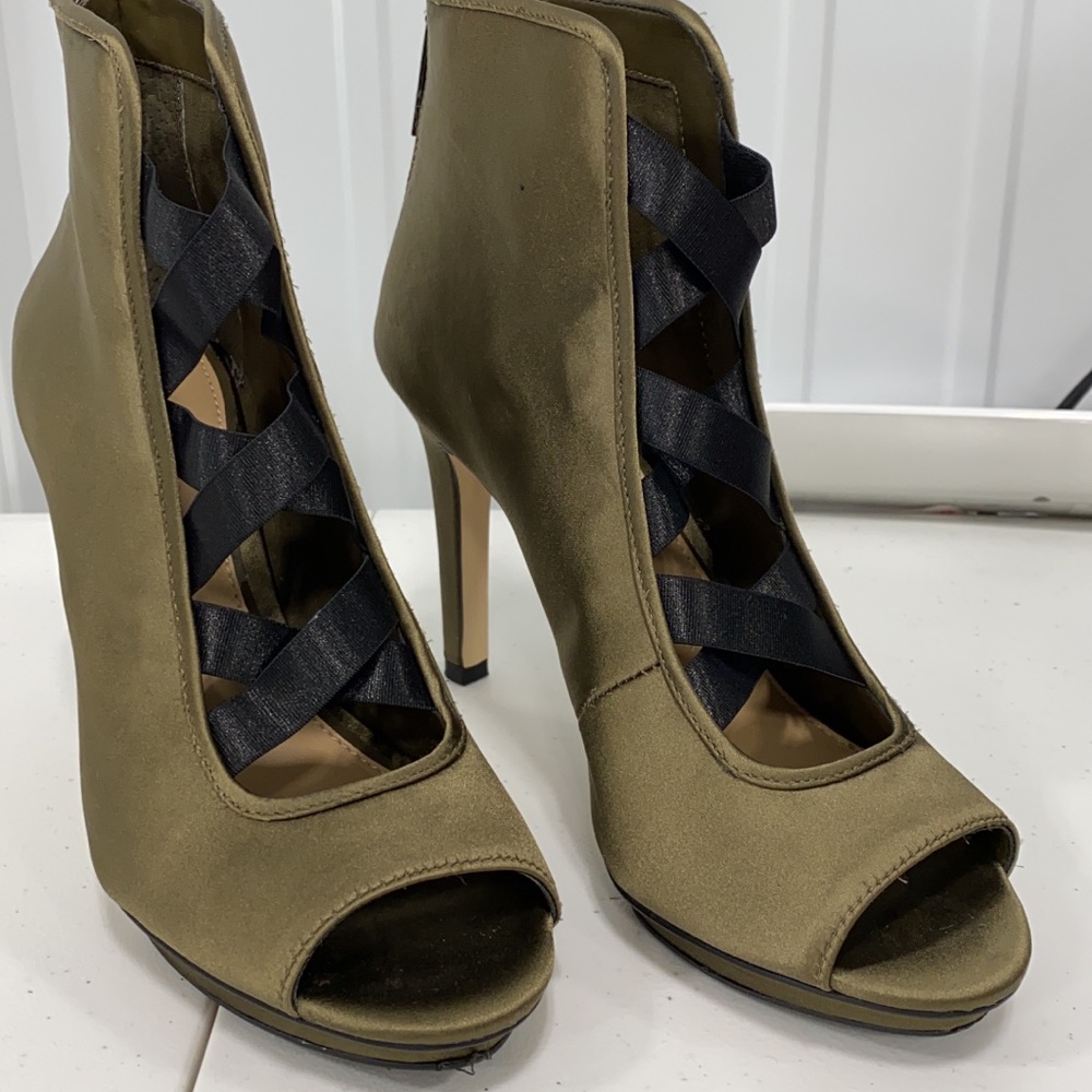 Worn once! Gorgeous olive green satin heels! May even have the box, not sure.